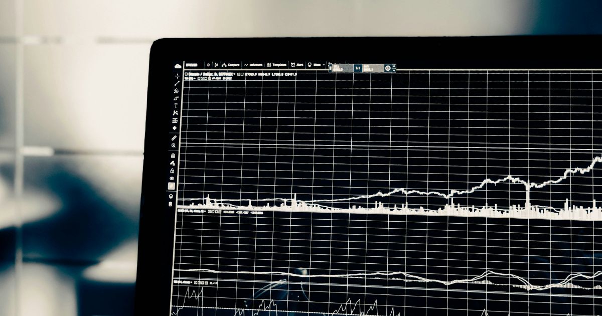 Computer monitor showing two line graphs with grid lines.