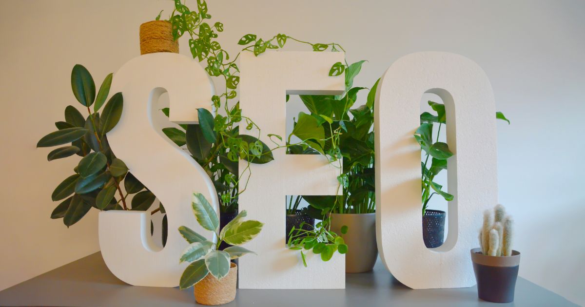 A professional office setting showcasing a team engaged in SEO strategies and digital marketing discussions.
