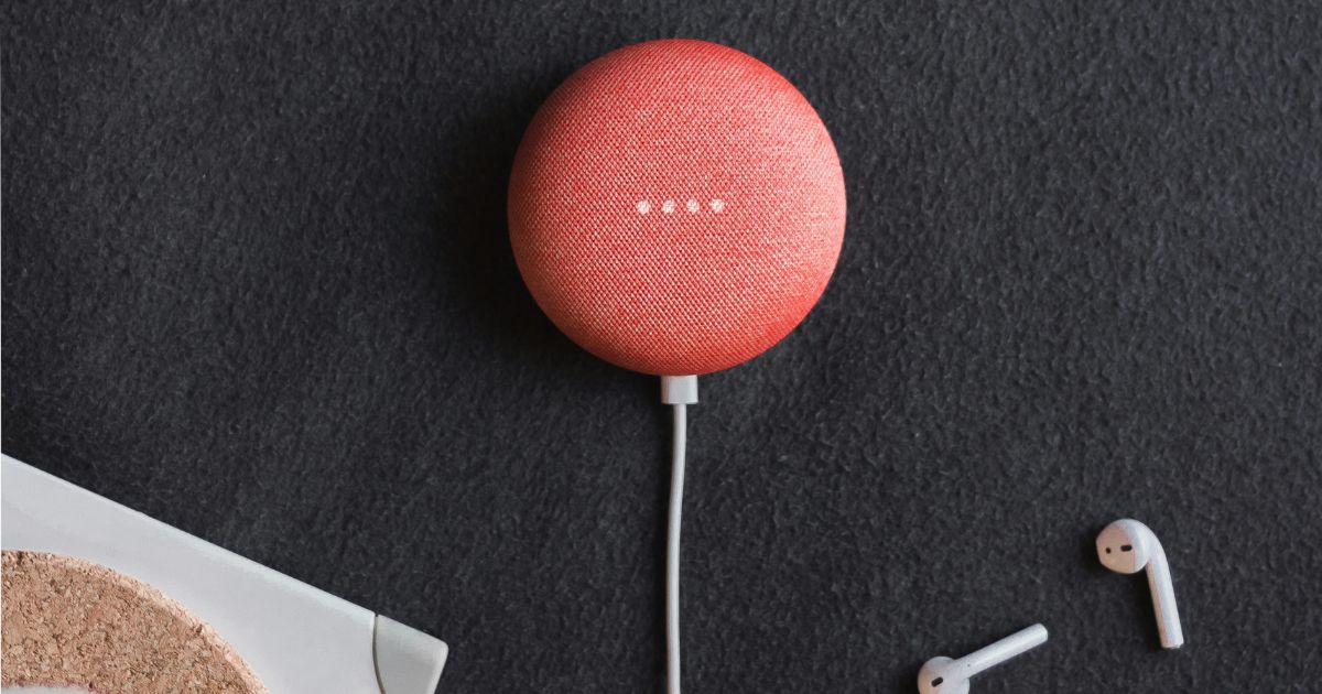 A vibrant red egg featuring a white apple design, showcasing creativity in Voice Interface Prototyping Tools.