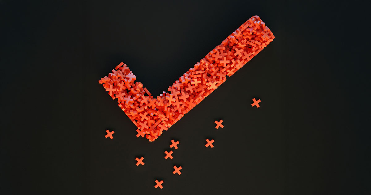 A red check mark composed of pieces on a black background, symbolizing success in accessibility testing tools.